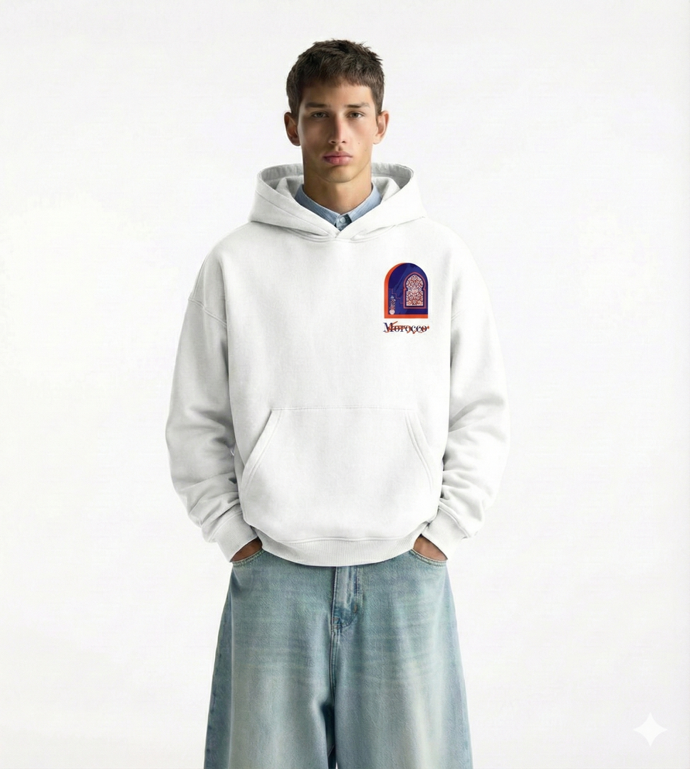 Man wearing a white hoodie with a logo "Morocco" on a white background